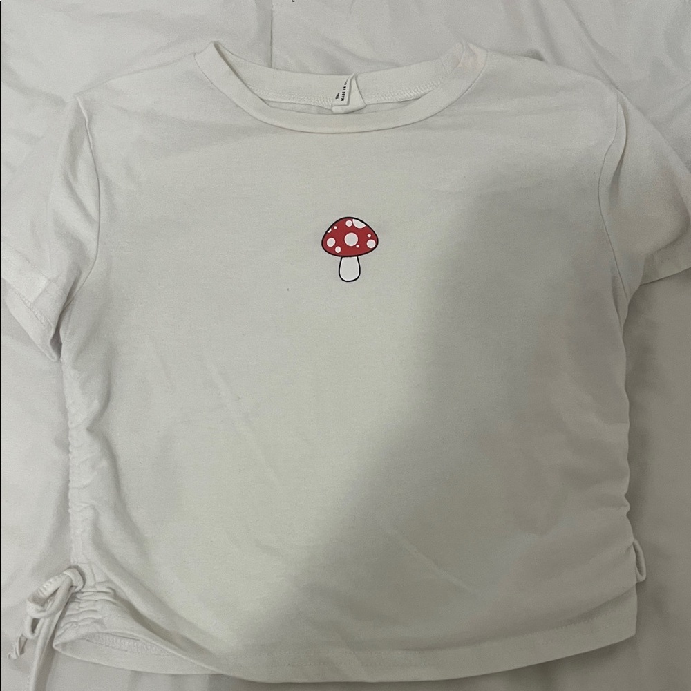 Charming White Kids' Tee with Red Mushroom Print